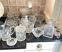 All cut glass items grouped on countertop
