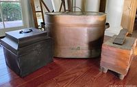 Copper tub, black metal box, wooden box full view