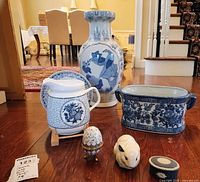 Group shot of all seven blue & white ceramic items