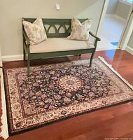 Area rug, bench and pillows full view