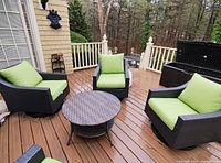 Full set on deck showing four chairs and table