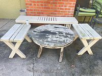 Round table, long bench, two small benches