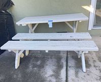 full view of picnic table and benches set