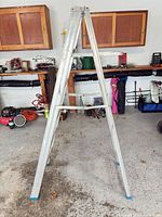 Full view of aluminum A-frame ladder opened