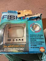 Front of original FishTV box showing monitor through window