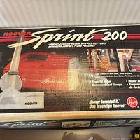 Box showing Hoover Sprint 200 branding and image of vacuum