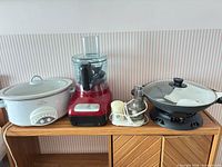 Group shot of all four appliances on shelf