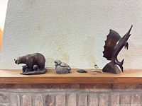 All five figurines on mantle for scale and overview