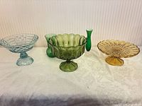 Group shot of all five pressed-glass pieces