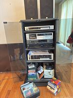 Full view of cabinet, speakers, media and cables