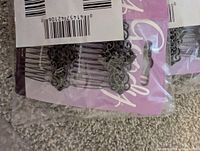 Shrink-wrapped bundle showing multiple Goody comb packs