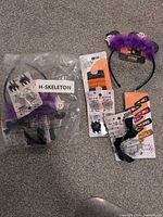 Lot overview showing packaged headbands, hair clips and snap clips