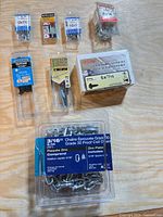 All eight screw and chain packages laid out