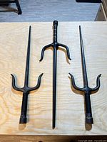 Three sai laid out to show overall form