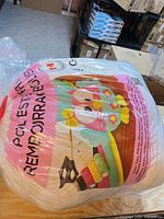 Bag of polyester fiberfill stuffing showing original packaging with owl graphic