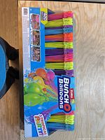 Front of sealed Zuru Bunch O Balloons Tropical Party pack showing multiple colour balloon stems