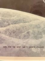 Close-up of printed title and artist name on the artwork