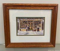 Full view of framed print showing artwork, matting and frame