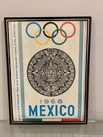 Front view of framed 1968 Mexico Olympic Games poster showing design and frame