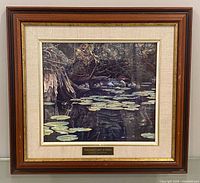 Framed Robert Bateman print showing artwork, mat and frame