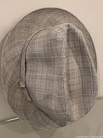 Front/top view of grey plaid fedora