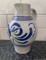 Full view of Gerzit stoneware jug showing decoration and form