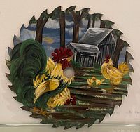 Front of painted saw blade showing full farm scene