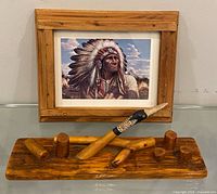 Overall lot: framed print, knife, wood base with pegs