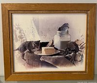 Front view of framed print showing full image and wooden frame