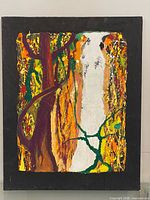 Front view of the painting showing full artwork with black border and abstract colours