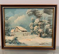 Full view of framed winter landscape painting showing signature