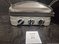 Front view showing controls and base