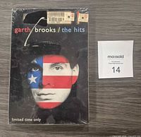 Front of sealed CD showing cover art and shrink-wrap tears