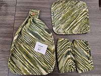 Full set showing towel, pad, two cloths