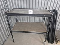 assembled two-tier unit showing uprights, wood shelves and overall construction