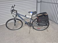 Full left side view of mountain bike with accessories