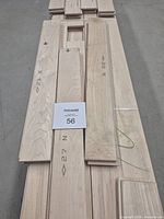 Close-up of maple boards showing tongue and groove edges and Nuance grade markings