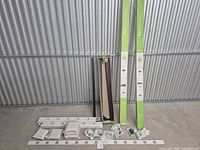 Overall view showing boxed top rails, pickets, bottom rail sections, hardware and post caps