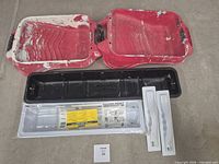 All items: two red Handy paint trays, black wallpaper trough, grey sealed wallpaper trough, two white smoothing brushes