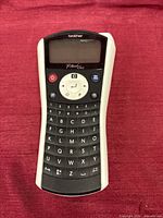 Front view of Brother PT-1090 label maker showing keypad and screen