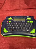 Front view showing keyboard, screen and colour scheme