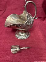 Gravy boat and scoop frontal view highlighting design and size