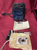 Entire lot with camera, manual, bag, cable, media case