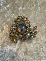 Front view showing rhinestone arrangement and center stone