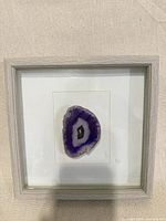 Full view of framed agate slice artwork