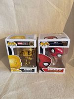 Front view of both boxed Funko Pop! figures Gamora #382 and Spider-Man #923