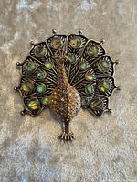 Front view showing cabochons and rhinestones