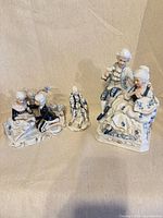 All three porcelain figurine groups together