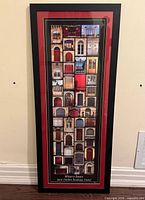 Full view of framed "Winery Doors" print leaning against wall