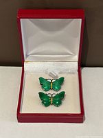 Pair of green enamel butterfly brooches in presentation box